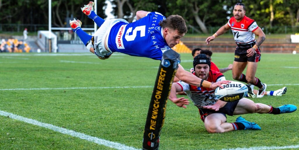 A marvellous Mario Facchini shot of Jets winger Sam Stonestreet scoring his first try against the Bears at Leichhardt Oval on Sunday. Photo: Mario Facchini, mafphotography